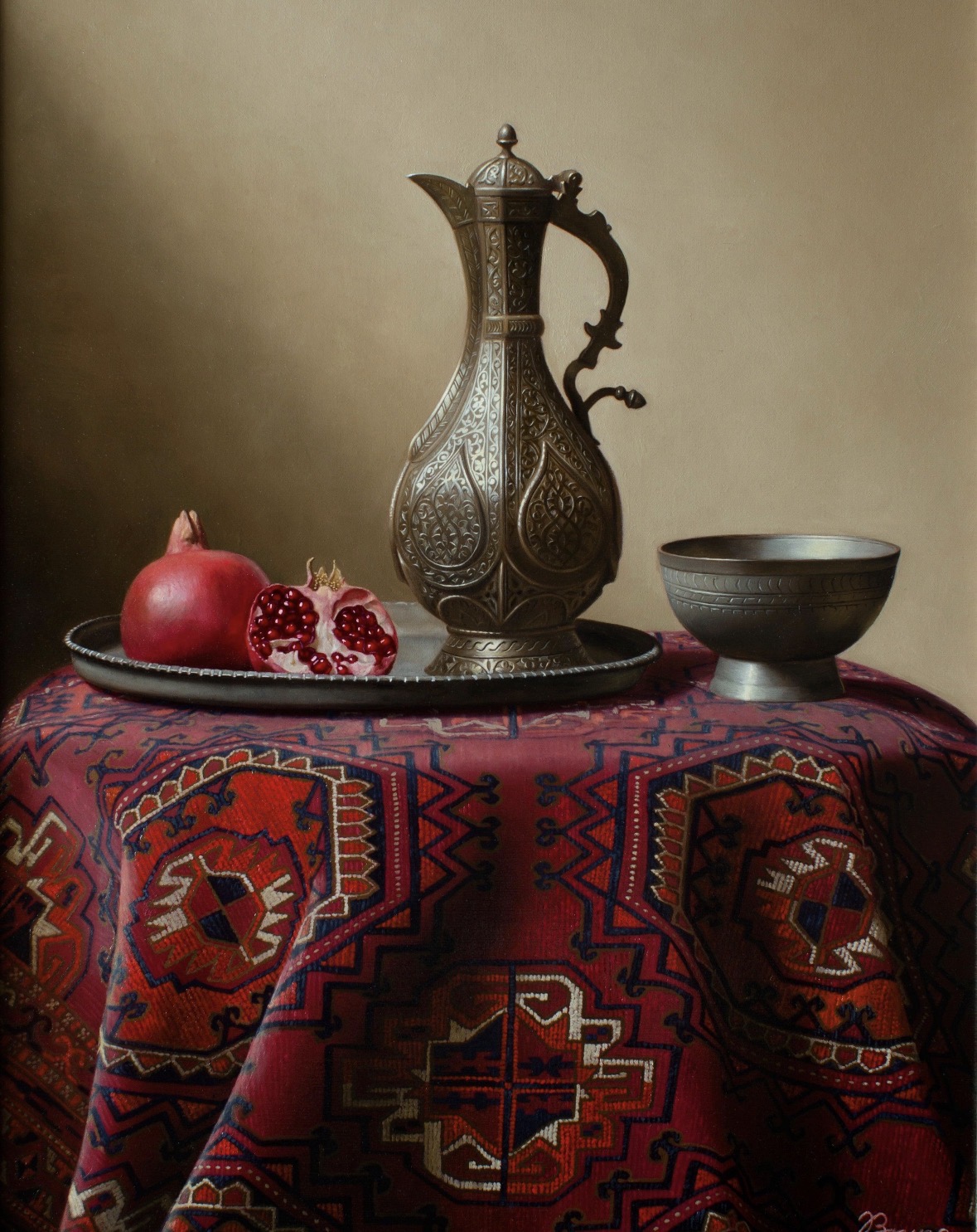 Pomegranates and engraved Persian metalware arranged on an antique rug